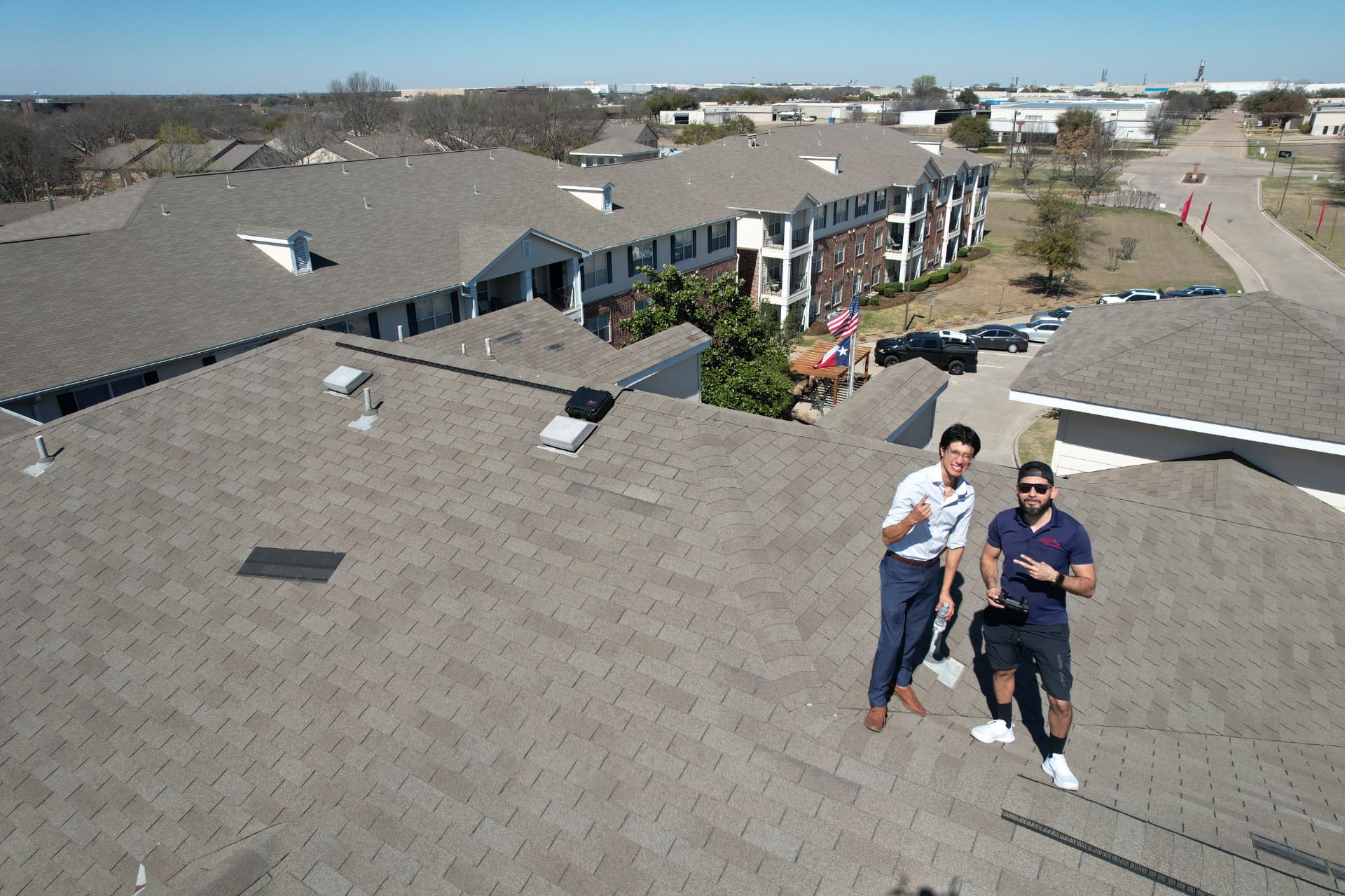 Low-slope commercial membrane roof system on a Dallas–Fort Worth business property