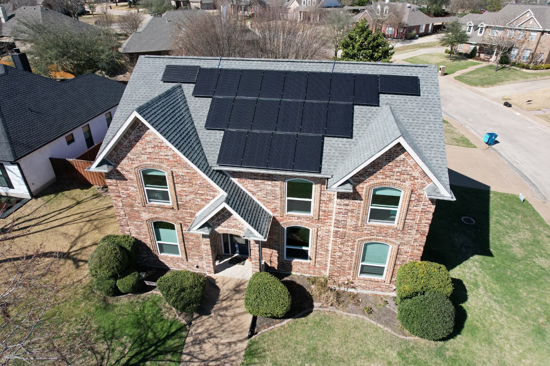 Newly installed asphalt shingle roof on a Dallas–Fort Worth home